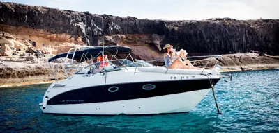 Armani anchored beneath the volcanic cliffs for a swim stop