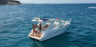 Guests on the stern of the Champagne at sea