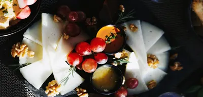 Premium catering aboard the Lady Sunshine — cheese and fruit board